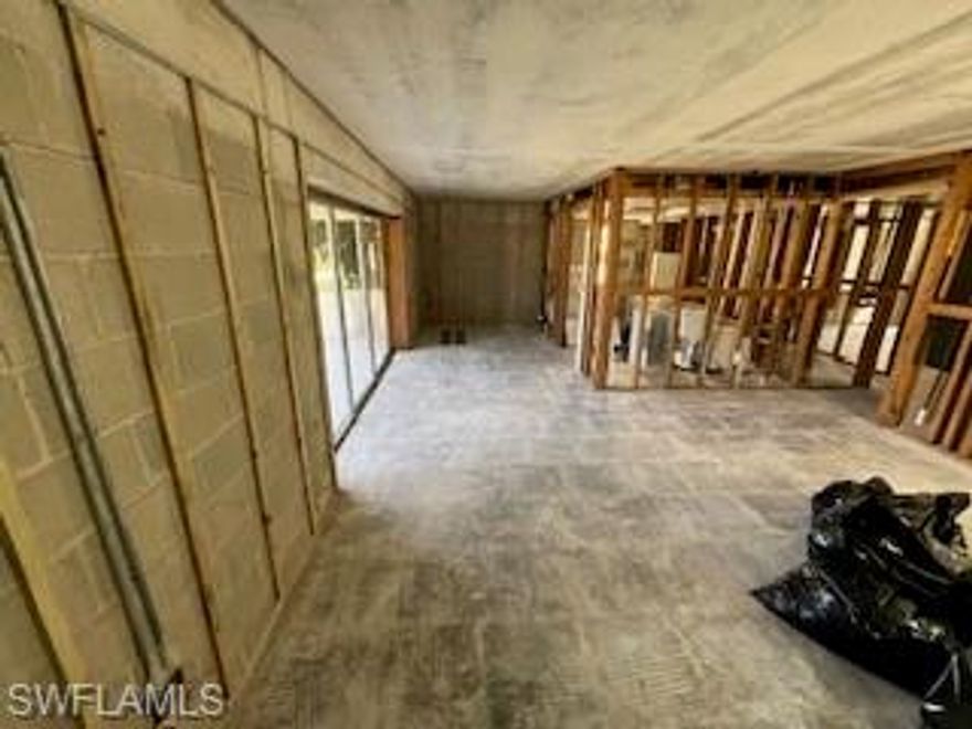 Unit has had everything removed due to Ian. Unit has been cleaned and mediated. All studs defining rooms, two bedroom along with two baths, are in place. This unit is being sold "As Is" buyer can continue on with the process of having work completed. Great opportunity to buy into a condo community that is located close to downtown. Walk to Tin City and 5th Avenue S.