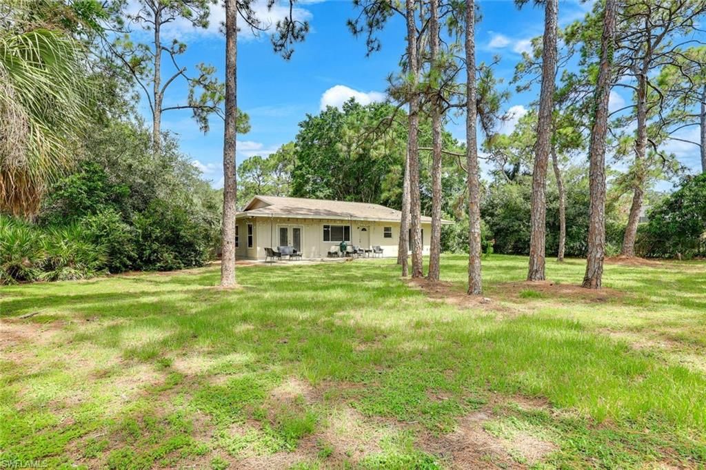 Photo of 131 Cajeput DR, NAPLES, FL 34108 (MLS # 225072363)