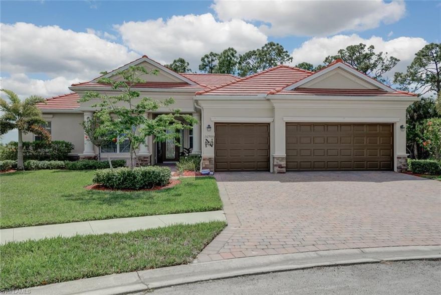 This Lennar Estate home - The Oakmont - is Lennar's most popular Estate Home and this gorgeous home sits on almost 1/2 acre pie shaped lot with lake views,  preserve views, and  has views of the golf course as well!  The pool and spa are very private because of the wide,  pie shaped lot.  This Golf Bundled home has many extras and has been meticulously and lovingly cared for. There are high-end built-ins, huge closets, and even an air conditioned, three car garage. The pool was converted to a salt water system and the home has a new tile roof courtesy of Irma, plus gutters all around.  The owner has added many extras like an electric retractable screen for the lanai, a whole house water purifcation system, remote pool controls, custom lighting and window coverings,  whole house surge protection, and Gorgeous master closet  as well as master bedroom builtins. Come tour this forever, NO EXCUSES home! Fees include yard care, the club amenties, cable and internet, AND GOLF, Tennis, Bocce! River Hall community - about 19 minutes from Down Town Fort Myers, short trde to I75.  This home will not dissappoint.,