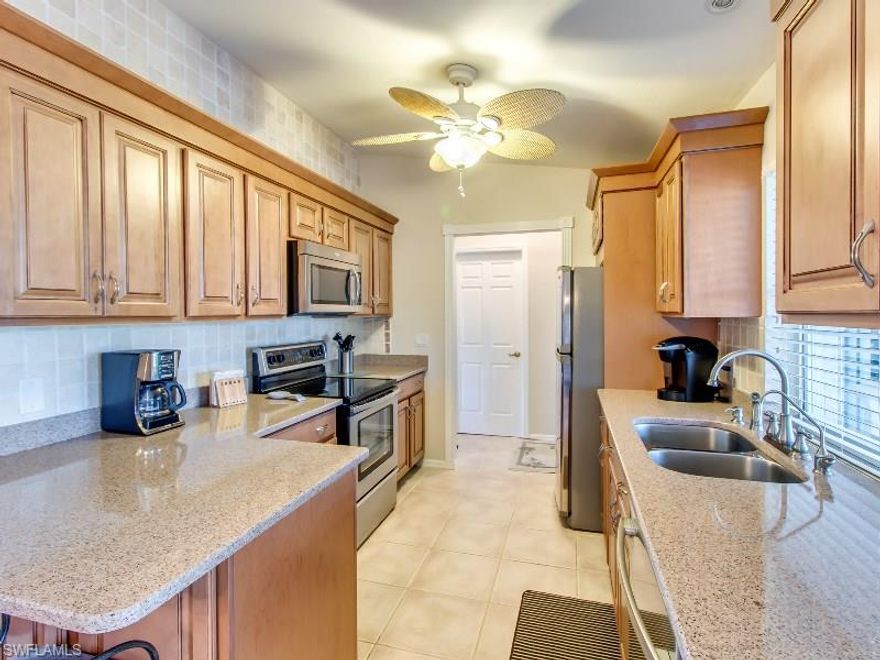 ABSOLUTELY IN PERFECT CONDITION!. This Great Gulf Access Home is the one you've been looking for.  This home features a beautiful Kitchen with Stainless Steel Appliances, Granite Counter Tops, and a lovely tile backsplash that runs the length of the wall. This home is just like new with a New A/C System and duct work in 2013, New Roof in 2013, New Exterior Paint 2014, Master Bathroom Remodel 2014, New Kitchen, New Guest Bath Remodel and New Plumbing done in 2015. Great Back Patio Space with Plenty of room for a pool. NEW, NEW, NEW!! Schedule your private tour today.