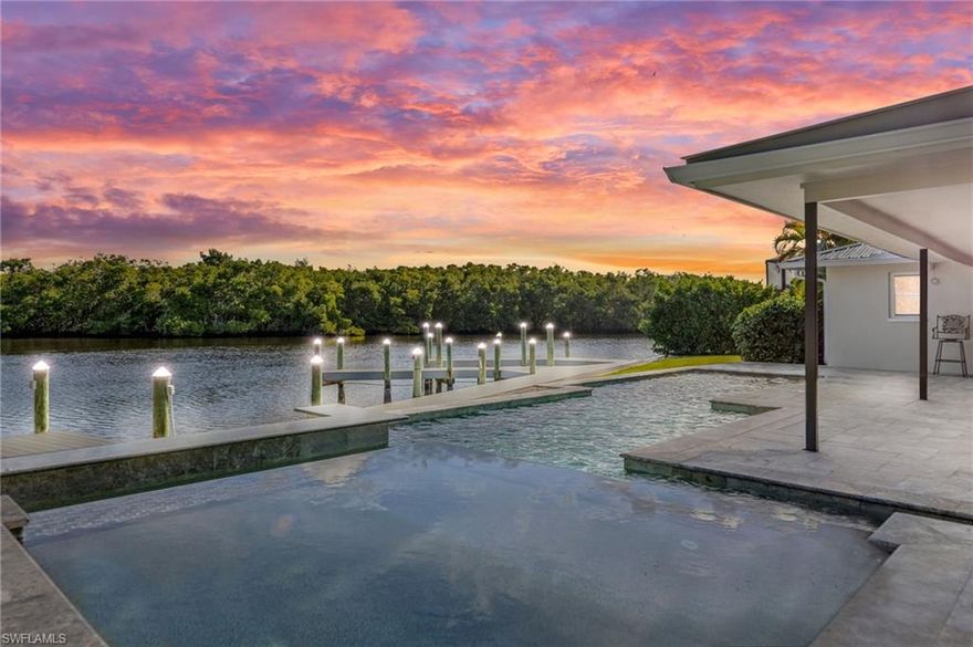 Welcome to your private Gulf-access oasis. This fully renovated waterfront residence offers refined luxury, breathtaking views, and an exceptional boating lifestyle in a peaceful, quiet neighborhood. The home features extensive upgrades, including new plumbing, electrical, air ducts, water heater, metal roof, and stainless steel appliances. A 2021 AC system and upgraded foam insulation enhance year-round comfort and energy efficiency. The oversized Gulf-access lot is complemented by a paver driveway, impact-rated garage door, and a fully fenced yard—creating a secluded retreat with only one neighboring property. Travertine stone leads to a custom resort-style pool complete with sun shelves, water features, and an integrated spa. A generous covered overhang provides shaded outdoor living without obstructing the panoramic views of Hancock Creek. Designed for boating enthusiasts, the property includes a private dock with captain’s walk—perfect for fishing, entertaining, or simply watching dolphins and manatees glide through the canal. To enhance your waterfront lifestyle, there is a brand-new 16,000-lb boat lift, offering effortless access to the water. Enjoy a quick five-minute boat ride to the Caloosahatchee River, with direct access to the Gulf of Mexico, nearby beaches, and waterfront dining. Please see virtual tour.