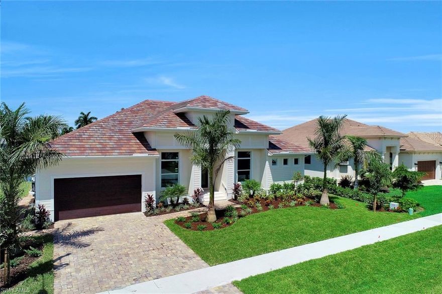 Beautifully designed classic coastal ambiance with contemporary sophistication this four-bedroom plus den, four-bath residence comes with over 2,400 air-conditioned square feet. This home has an open spacious great room floor plan with a large gourmet kitchen that includes a dining area, Island with breakfast bar, Viking stainless steel appliances, custom cabinetry, pantry, and more. Finely crafted finishes include crown molding, granite and marble counter-tops, natural stone flooring throughout, tray ceilings, neutral color palette, led lighting, impact glass windows and doors, pavered drive and walkway. The expansive screened lanai provides plenty of outdoor living space for relaxation and recreation with a summer kitchen, built-in grill, sparkling saltwater system pool and spa. Southwest exposure for spectacular sunsets overlooking the lovely canal views offering water indirect access for incredible boating and fishing. New seawall. Located in a great neighborhood and close to shopping and dining. Experience the Marco Island lifestyle today. Home has been staged and is partially furnished. Furnishings are worth approximately $22,000.