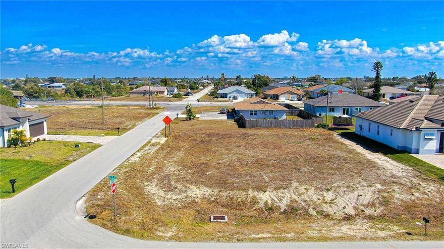 *PHENOMENAL OPPORTUNITY TO BUILD YOUR DREAM HOME IN OVERSIZED CORNER LOT in CAPE CORAL SWFL PARADISE!* This 0.269-acre VACANT RESIDENTIAL LOT in NE CAPE CORAL (NORTH 2) offers an EXCEPTIONAL OPPORTUNITY TO CREATE YOUR IDEAL LIVING SPACE! Perfectly situated for BUILDING A CUSTOM HOME, this SPACIOUS PROPERTY measures 95 feet by 124 feet, providing a generous 11,718 sq ft OF LAND TO BRING YOUR VISION TO LIFE INCLUDING THAT OVERSIZED CIRCULAR DRIVEWAY! Located in ZONE D - 4th evacuation zone – this property DOES NOT REQUIRE FLOOD INSURANCE! The lot is CLEARED, OVERSIZED, RECTANGULAR and READY FOR CONSTRUCTION with CITY WATER and SEWER: design a home with plenty of room for both INDOOR and OUTDOOR LIVING! City water and sewer are in place and provided by the City of Cape Coral, with electricity available through LCEC. All public roads are paved. The remaining utility assessment balance of $7,431.19 (from an original amount exceeding $35,000) is to be assumed by the buyer. Imagine waking up in your new home and stepping outside to enjoy the Florida sunshine and refreshing breezes. With ample space, you could create an outdoor paradise - whether it's a POOL, a GARDEN, or a BEAUTIFUL PATIO for ENTERTAINING FAMILY and FRIENDS. This exceptional residential vacant lot features a highly desirable EAST REAR EXPOSURE, welcoming beautiful morning sun in your future backyard and outdoor living areas while providing natural afternoon shade for cooler, more comfortable enjoyment of your lanai and pool. This orientation helps reduce late-day heat load on the rear of the home, supporting IMPROVED ENERGY EFFICIENCY, and allows for bright, balanced natural light throughout the interior living spaces. Whether you're looking to BUILD A CONTEMPORARY DESIGN with EXPANSIVE WINDOWS or create a LUSH GARDEN OASIS, this LOT'S ORIENTATION offers both PRACTICAL and AESTHETIC ADVANTAGES, making it the IDEAL CANVAS for your DREAM PROPERTY! Located close to NE Pine Island Road, this lot provides EASY ACCESS to nearby amenities, schools, and recreational areas! It’s also in an ideal position for exploring Florida’s natural beauty and outdoor activities! This lot is situated in ZONE D, meaning NO FLOOD INSURANCE is required upon construction. The location is also HIGHLY ACCESSIBLE, with connections to the E-W CORRIDOR NE Pine Island Rd. taking you to Fort Myers and North Fort Myers also making travel easy whether you're heading NORTH through I-41 or I-74 towards Punta Gorda, Venice, and Sarasota, or SOUTH to Bonita Springs, Naples, and Marco Island. SWFL INTERNATIONAL AIRPORT is just 21.3 miles away, adding to the CONVENIENCE. DON'T MISS THIS CHANCE TO SECURE A VALUABLE PIECE OF LAND IN A PRIME LOCATION! WHETHER YOU ARE LOOKING TO BUILD A FOREVER HOME OR MAKE AN INVESTMENT FOR THE FUTURE, this lot offers THE PERFECT OPPORTUNITY FOR YOUR NEXT PROJECT! ACT NOW AND TURN YOUR DREAM INTO REALITY!!