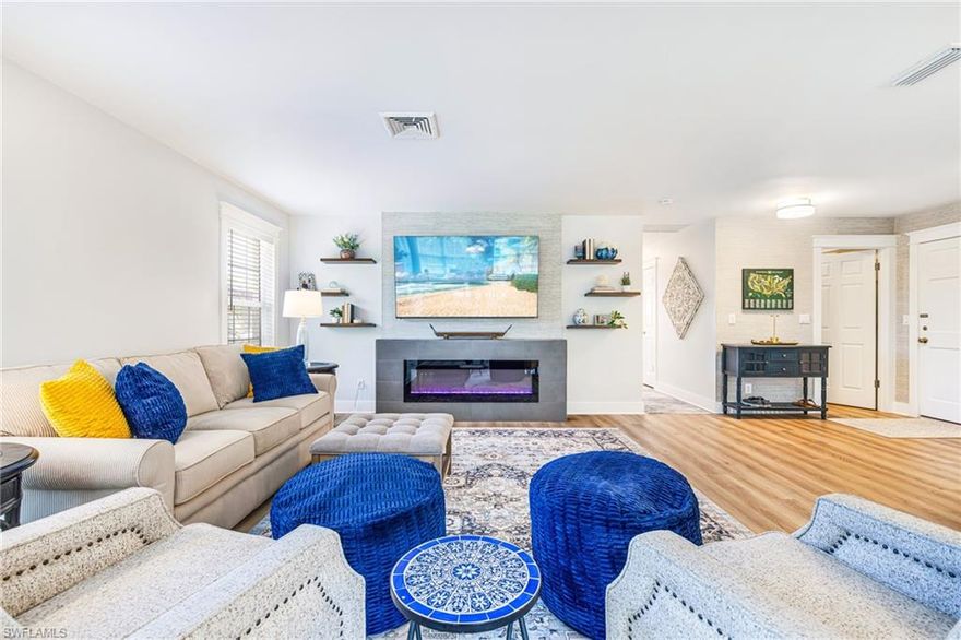 DON'T DELAY! Now is your chance to own a PRIVATE OASIS at Stratford Place Condos! This FULLY RENOVATED PENTHOUSE condo is nestled in the canopy of the palms and offers the perfect blend of luxury and tranquility. With 2 bedrooms, 2 bathrooms, and an OPEN-CONCEPT LIVING area, this CORNER END-UNIT provides maximum NATURAL LIGHT with CYPRESS LAKE GOLF COURSE & LAKE VIEWS. Cozy up by the ELECTRIC FIREPLACE on cool evenings or take a dip in the COMMUNITY POOL on hot summer days.  Keep your vehicle protected from the elements with the assigned CARPORT.  The kitchen is every chef's delight with sleek GRANITE counters, STAINLESS-STEEL appliances, white shaker cabinets, and a breakfast bar/island that's fit for royalty and perfect for entertaining. The bathrooms are equally impressive with MODERN fixtures that exude sophistication.  This gem offers a host of TOP-OF-THE-LINE features that are sure to impress even the most discerning buyer: updated light fixtures, wood-look LVT throughout, modern baseboards, trimmed windows, and styled with the utmost attention to detail.  Furnishings and decor are negotiable for a MOVE-IN READY or RENT-READY experience.  Whether you're looking for a full-time residence, vacation getaway, or annual rental, this condo has everything you need and more.  Situated in a PRIME LOCATION off Cypress Lake Dr, you are minutes away from ample shopping, dining, entertainment, and the exquisite beaches of SWFL.  With all these incredible features and more in a super friendly and active community, this condo truly offers the BEST VALUE BUY!!  Live the luxurious lifestyle you deserve in this peaceful penthouse retreat!