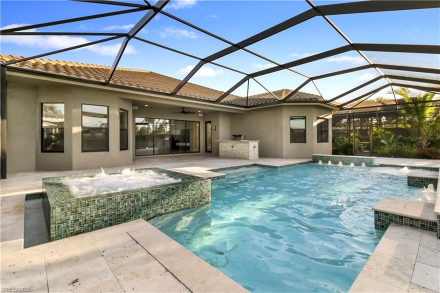 Only Carlyle available in Stonecreek! A gated courtyard opens to this like-new 3 bed+den pool home with 3.5 baths, 3 car garage. The open concept great room with a wet bar next to the formal dining room is perfect for entertaining. The large kitchen includes a natural gas upgraded Thermador stove that provides the most seasoned chef an opportunity to create. A guest bedroom with a full bath near the bonus room creates a guest suite you'll be glad to offer to family & friends. Master bedroom and bath with walk-in shower, dual sinks, and luxurious tub are complemented by two custom California Closets. The perfect Florida weather allows you to relax year-round by your custom pool & connecting spa while overlooking lake views. Fire-up the custom outdoor kitchen and grill which sits atop your travertine pool deck. StoneCreek includes a Lifestyle Complex with 2 pools and kids water play area, Tiki Hut, shade cabanas, fitness center, 5 lighted Har-Tru tennis courts, 4 pickleball courts, and full-time activities director to keep you entertained. Conveniently located within a few minutes to Logan Landings which features Sprouts grocery, restaurants, nail, and hair salon.