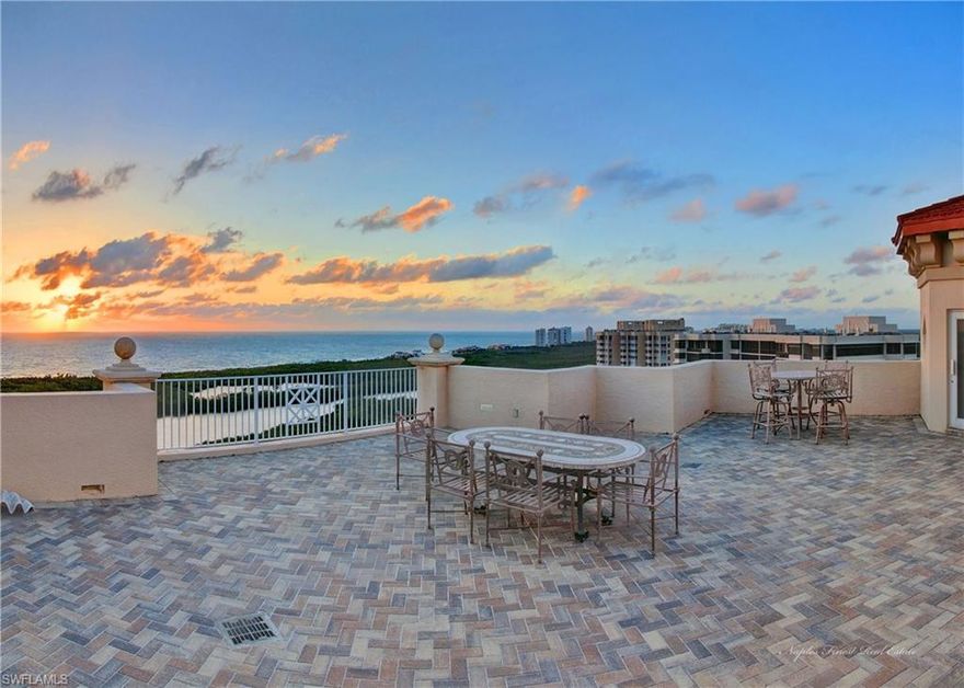 C.13569 - Exquisite penthouse with artistic, handcrafted moldings by an internationally recognized master carpenter in the masterpiece building, Cap Ferrat.  This luxury home has stunning views horizon-to-horizon with 7 screened/open terraces plus roof decks with wine bar, sauna, spa and crows nest with fireplace. Living area has private spaces and gathering places catering to every need. Fine design features with crystal chandeliers, beveled mirrors, and delicate hand-painted accents create an ambiance of unparalleled excellence. Cap Ferrat has private elevator entry, 3 parking spaces and steps-away access to the incomparable white sand beach amenities including 2 private beach pavilions with indoor/outdoor dining and lounge/umbrella service. Other private Pelican Bay amenities include 18 tennis courts, state-of-the-art fitness center and much more. The Club Pelican Bay offers equity membership to Arthur Hills designed 27-hole golf course. Newly constructed Clubhouse has a sweeping 2-story entrance and verandas creating elegant beach-plantation feel. Public amenities within Pelican Bay include world-class entertainment, art and shopping facilities plus two 5-Star hotels.