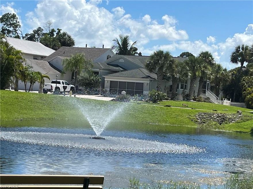 Here is your chance to own a Florida style home in a great neighborhood with boating access and community pool.  That's right, this home located in Island Park Woods is situated across the street from two lakes with water features and a quick walk to the community pool.  As you enter you will notice the custom tile at the front door, the bamboo floors and the great room with vaulted ceilings with large pocket sliders to the screened porch.  A pass thru from the kitchen to the formal dining area and in the kitchen a separate breakfast nook overlooking the lake.  The kitchen features stainless steel appliances, wood cabinets, granite counter tops and a large panty along with a laundry center. The master features wall mirrors, a separate door to the porch and large closets.  The master bath has dual sinks with granite counter tops, a soaking tub and a large shower with frameless glass door. Guest bedrooms share the second bath with granite vanity and tiled shower/tub. The back yard is set up for entertaining with beautiful landscaping with privacy fence, a fire pit, paver patio and views of the lakes & fountains.  A community pool & boat dock/ramp with gulf access. 8x12 shed included.
