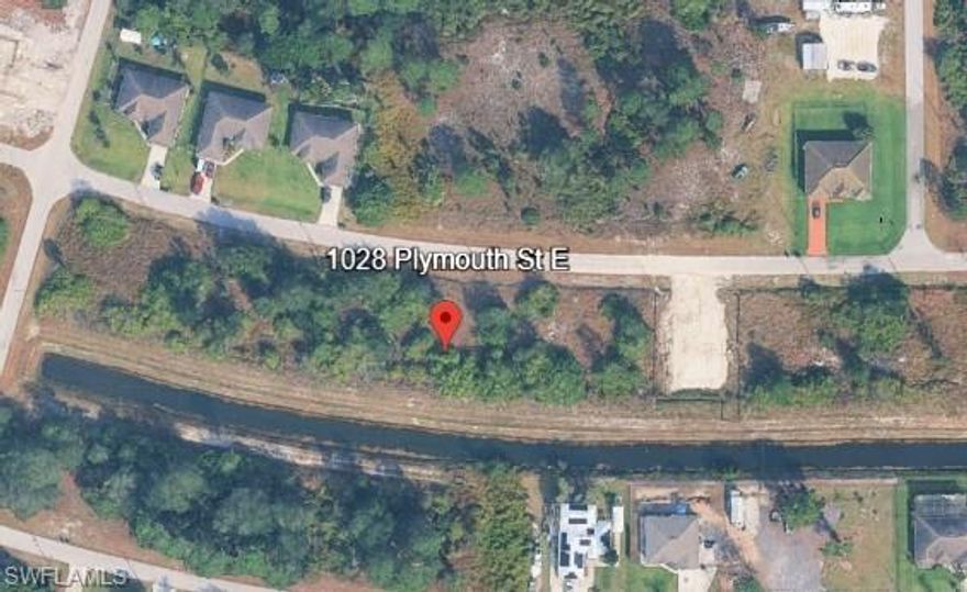 CANAL ON BACK, SEMI CLEAN LOT, ELEVATED LOT WHICH WILL SAVE BUILDER MONEY ON FILL. 

ENVIRONMENTAL REPORT INCLUDED ON SALE. CLEAN LOT.