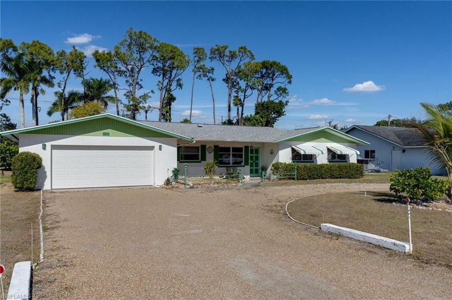 Beautiful concrete block home (NOT IN FLOOD ZONE) centrally located to shopping, restaurants, and entertainment. This 3 bedroom 2 bathroom home is wheelchair accessible & features an oversized garage, circular driveway for extra parking, newer water heater, extra storage closet with electric. There are additional cabinets and workshop in garage for all you craftsman. Roof was replaced in 2022 and A/C was replaced in 2025. The primary bedroom is spacious with a newly painted bathroom. The kitchen is retro from the 1960s and offers a glass cooktop and plenty of counter space. There is also an enclosed sunroom that is currently being used as a bonus room for an office or entertainment space. Step outside to a large backyard with plenty room & space for a pool or Spa. Mature pine trees give you some afternoon shade that you & your 4 legged friends will enjoy. The villas is a well established neighborhood located 20 minutes from SWFL International Airport, 20 minutes to the beach, and 20 minutes to downtown Fort Myers. Come and explore the possibilities this home offers today!