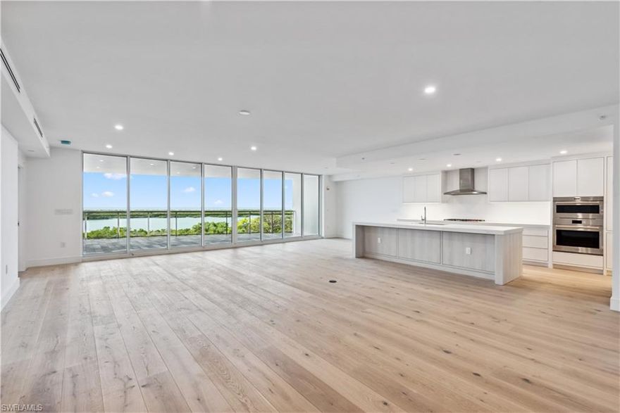 TOWER 400 has just been completed, and unit 704 is a blank canvas with a neutral palette for you to make it your own. The residences at Kalea Bay are designed to be a coastal retreat, where peace, comfort, and convenience come together for a rich and carefree lifestyle.
This luxurious 4-bedroom, 4.5-bath unit features a private elevator that opens directly into your home. It includes 3 guest en-suites, high ceilings, and floor-to-ceiling sliding doors that span the entire width of the generous 3,290 sqft unit. The "04" floor plan offers the largest lanai with over 600 sqft of outdoor living space.
The kitchen and main living area face the Gulf of Mexico, ensuring you never miss a sunset. The designer kitchen seamlessly blends into the living and dining rooms, perfect for casual entertaining. It includes Subzero and Wolf appliances, as well as a butler's pantry with an additional sink.
The owner’s suite features sliding doors leading out to the lanai, a spacious walk-in closet, and a tranquil bath with dual vanities and a soaking tub. Kalea Bay has thought of everything, so you can move in, bring your furniture, and start enjoying a carefree coastal lifestyle immediately. World-class amenities are just a few steps away.