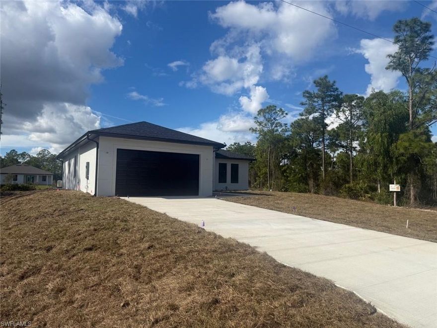 Beautiful new construction home built in 2025 in Lehigh Acres, featuring a modern design with ceramic tile flooring throughout. This home offers 3 bedrooms, 2 bathrooms, plus a dedicated office, providing flexible space for work or everyday living. The backyard boasts a spectacular canal view, creating a peaceful and scenic setting ideal for relaxation or entertaining. Conveniently located near SR-82 with easy access to Naples and Fort Myers, this property offers both comfort and an excellent commuter location.