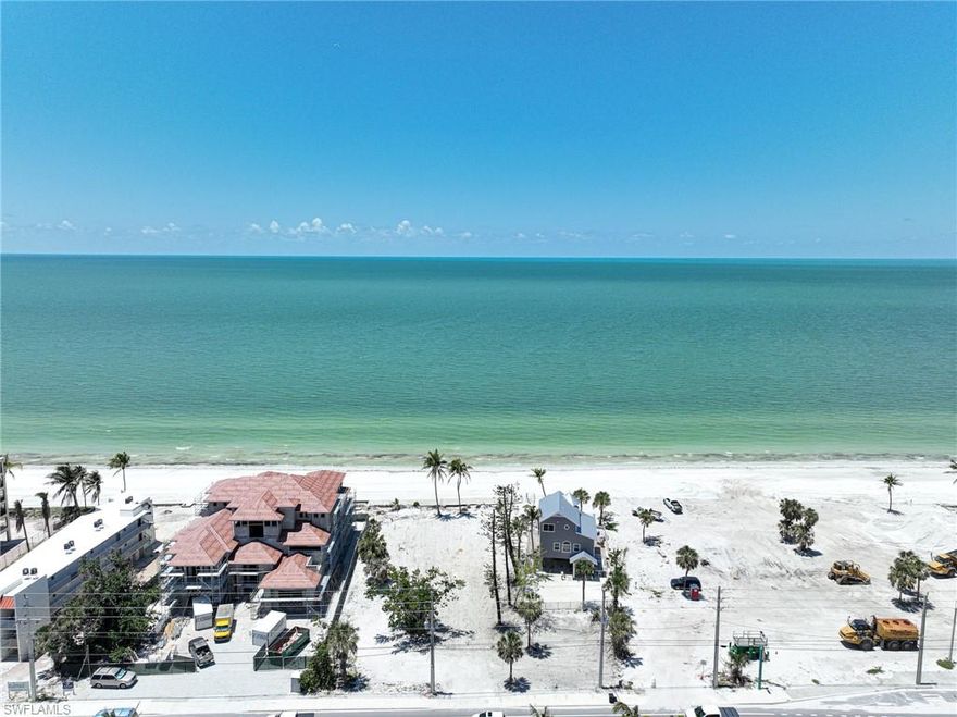 This beachfront property consists of three lots, has the ideal mid island location and is conveniently located across street from the Publix center.  It has 150 of street frontage, 100' of beach frontage and is 175' deep for a total of 20,282 square feet, has been cleared and has approval for two residences. There was previously both a duplex plus another home on the property.