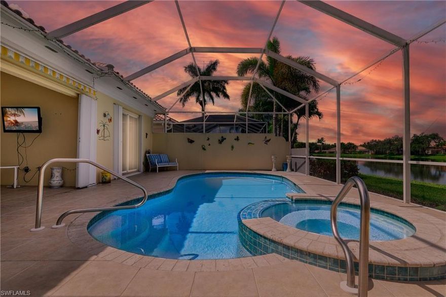 Enjoy lounging in your own Private SPA, while taking in gorgeous Lake Views and Magnificent Sunsets from your West facing outdoor Oasis. Then take a dip in your Custom Built, Solar Heated Pool. Life is Good at the Active, Friendly and Award Winning Community of Island Walk, with Fabulous Amenities for the whole family to enjoy. This home is Bright, Spacious, and Airy with 12 ft Volume Ceilings, New driftwood colored flooring throughout,  Reverse Osmosis system, Motorized Retractable Awning off the Lanai and Central Vac. Resort Style Pool, Lap Pool, Poolside Restaurant, Tennis, State of the art Athletic Center, Pickleball, Putting Green, Active Town Center and endless walking paths are just some of the neighborhood features. Island Walk even has it's own Post Office, Gas Station and Car Wash for All Inclusive Living.