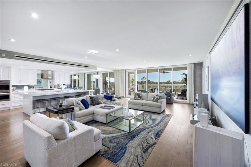 Annual Rental! Introducing the epitome of luxury and sophistication in the coveted Kalea Bay community! This stunning 2 bedroom, 3.5 bathroom residence is situated on the third floor, offering views of lush natural surroundings and wild life. The open floor plan is perfect for entertaining guests, boasting a gourmet kitchen with high-end appliances, a spacious living area, and a dining room with access to the expansive lanai. The master suite is a true oasis, featuring a private balcony entrance, a very large walk-in closet, and a spa-like ensuite bath with a soaking tub and dual vanities. The guest wing is comprised of one additional bedroom, a separate den, and a fully equipped office. Additional highlights of this immaculate home include hardwood flooring throughout, a laundry room, and hurricane impact windows and doors for added peace of mind. Residents of Kalea Bay enjoy world-class amenities, including a resort-style pool, fitness center, tennis courts, and a clubhouse.