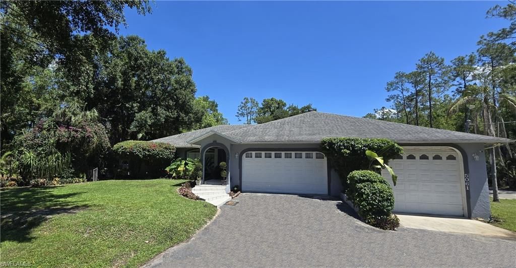 Photo of 5061 Mahogany Ridge DR, NAPLES, FL 34119 (MLS # 226019612)