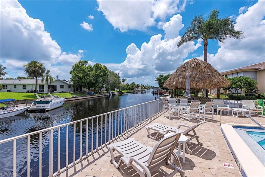 Don't miss this opportunity to buy this adorable condo in Cape Coral, Florida! Greenbriar is conveniently located within walking distance to restaurants and shops in south Cape Coral's "downtown" district. This first floor, end unit has 2 large bedrooms and 2 bathrooms with lots of natural light throughout. It is turnkey furnished with linens and a full kitchen. There is a TON of storage- walk-in master closet, large guest bedroom closet, linen closet, coat closet, massive interior storage room and a small exterior storage closet. You can walk just a few steps out to the heated pool or relax in the tiki hut over looking the canal. New AC and water heater in December 2016. Call today to schedule a showing!