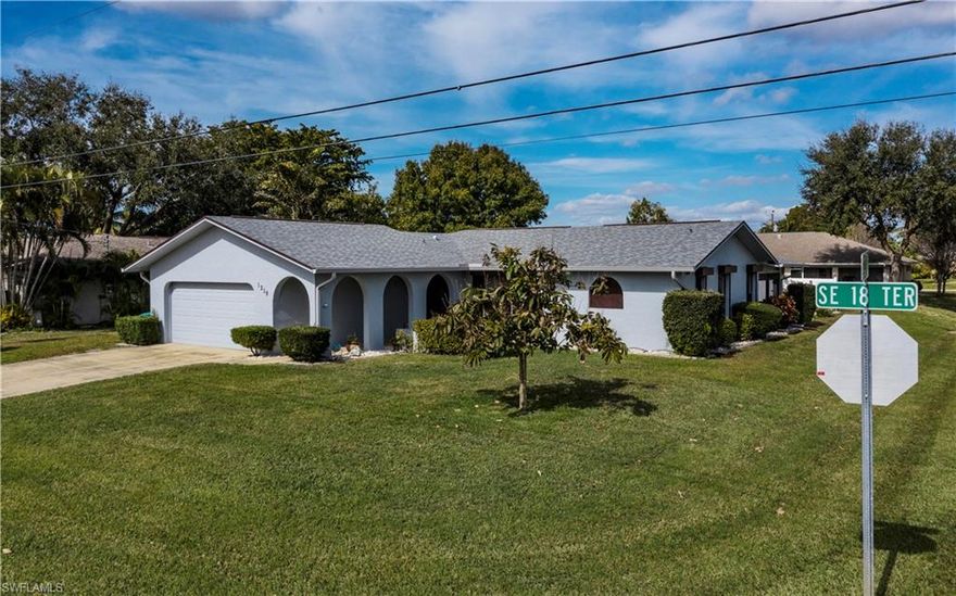 Very well maintained this home sits on a large corner lot with a fenced yard. NEW roof in 2018  NEW A/C and duct work in 2019 The yard has a privacy fence on 2 sides and a 16 x 20 patio. Inside your large kitchen has beautiful Stainless Steel appliances and cabinets galore! Tile flooring throughout including the bonus room and screened lanai under truss.  On city water with all assessments paid