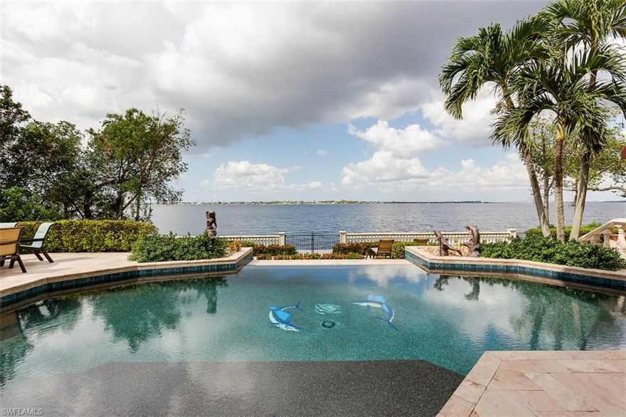 Reduced $400,000! Spectacular Riverfront Home in Prestigious Gulf Harbour Yacht & Country Club has Panoramic Water Views. Gorgeous Remodel throughout with Travertine flooring flowing from the Interior Living Areas to the Outside Waterfront Living Area and Circle Drive Entry. Chef's Gourmet Kitchen with Rich Wood Cabinetry, Granite,  top of the line Thermador and Sub-Zero Stainless Appliances, Big Breakfast Bar  and Open to the Family Room with Custom Builtin Entertainment Center. Outdoor Kitchen overlooking the River with Lynx Stainless Grills, Custom Cabinetry with Large Screen TV plus Covered Outdoor Bar with Stainless and Tongue & Groove Ceiling Cabinetry and Large Screen TV both adjacent to Custom Pool with Infinity Edge and Exercise Swim Jet plus Hot Tub. Living area Storm Rated Sliding Doors open to Huge Covered Lanai area with Cedar Tongue & Groove Ceiling, Large Screen TV, Gas Fireplace, Both Retractable Screens and Storm Screens, Insect Eliminator Misting System, Firepit Table, 3+ Car Garages and More. See attached Improvements/Upgrades List for more detail!