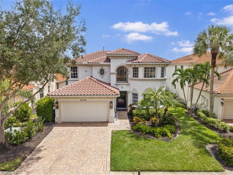 Photo of 12710 Aviano DR, NAPLES, FL 34105 (MLS # 226033258)
