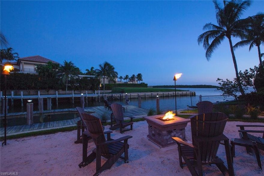 Great views of Sunsets and the Gulf of Mexico! An Award-winning remodel has taken place in this now astounding residence. Entertain in elegance or casual lifestyle with seating and flatware for 40. An oversized Island is the focal point of the luxury kitchen with white shaker style cabinetry and top of the line appliances. The large covered, screened, and electric shuttered terrace has a summer kitchen, a wet bar, a TV for entertaining guest’s prior to dinner. The open-air pool lanai with vanishing edge pool/spa and beach area (tiki torches and fire pit) offer an abundance of sunning areas. The Movie theater is ready for you after you enjoy the gorgeous Marco Sunset. The 3rd level tower room that could be a great office or bedroom. The Master suite with fireplace, second laundry. and huge walk in closet is the perfect get away with your own screened lanai and open sun deck. Engineered wood floors and light gray walls with white accents add to the coastal contemporary flair of this Estate home. This home is excellent for a family retreat (the children will love to visit) or a year- round home for you. Now offered fully furnished.