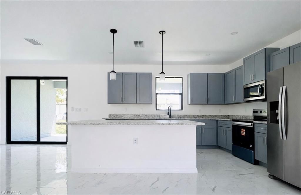 Photo of 1507 W 11th ST, LEHIGH ACRES, FL 33972 (MLS # 226015501)