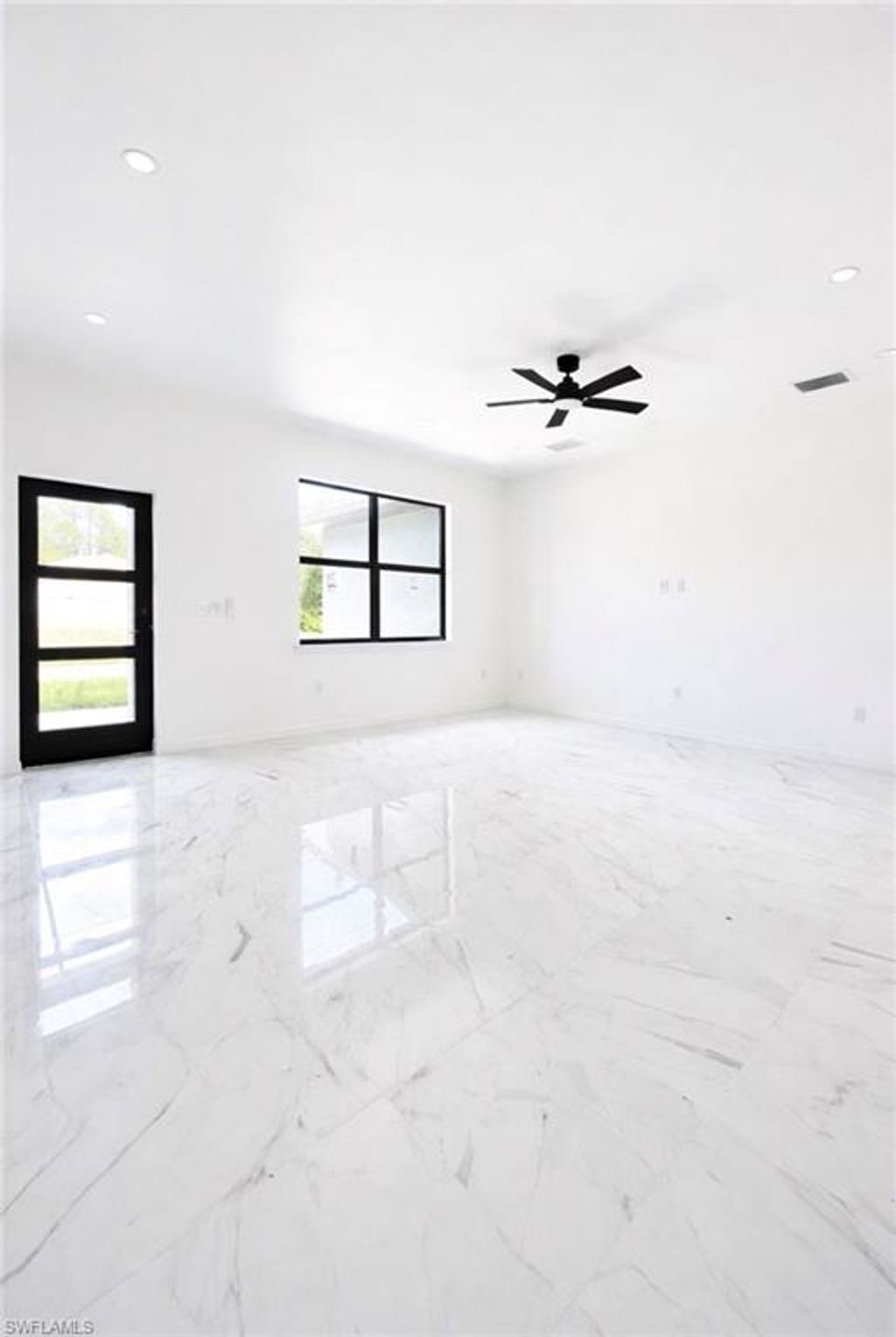 Photo of 1507 W 11th ST, LEHIGH ACRES, FL 33972 (MLS # 226015501)