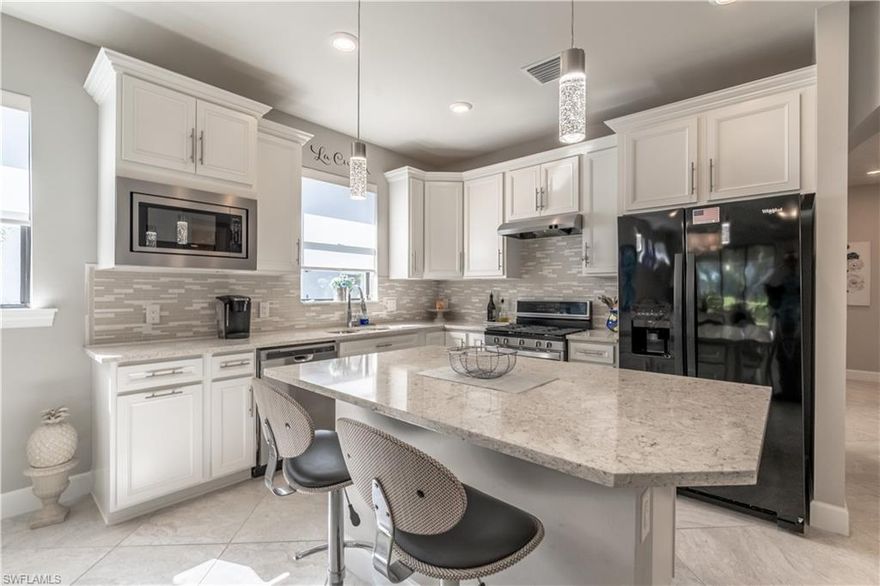 Don’t miss this exceptional opportunity to own an upgraded Cressida villa in the sought-after community of Winding Cypress! This front-entry home lives like a single-family residence, offering 2 bedrooms + den, 2 bathrooms, a 2-car garage, and a stunning expanded patio with extra covered space—more than most villas.

Inside, enjoy luxury upgrades including white cabinetry, quartz countertops, crown molding, and more. The outdoor space is equally impressive, featuring a built-in hood for effortless grilling and gorgeous mature landscaping.

Winding Cypress is a natural gas community with resort-style amenities! Dine at Shady Palm, the onsite restaurant, or enjoy pickleball, bocce, tennis, a state-of-the-art fitness center, a resort-style pool, a community garden, and even a dog park for your furry friend.

This pet-friendly community allows rentals, has low fees, and boasts a prime location—central to Marco Island, 5th Avenue, and I-75.