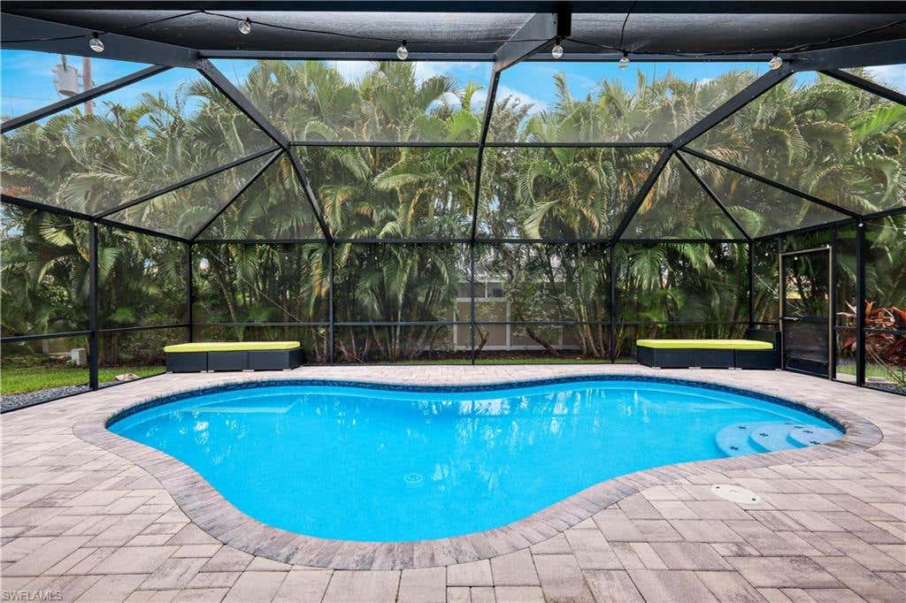 Photo of 1509 SW 52nd LN, CAPE CORAL, FL 33914 (MLS # 226026625)