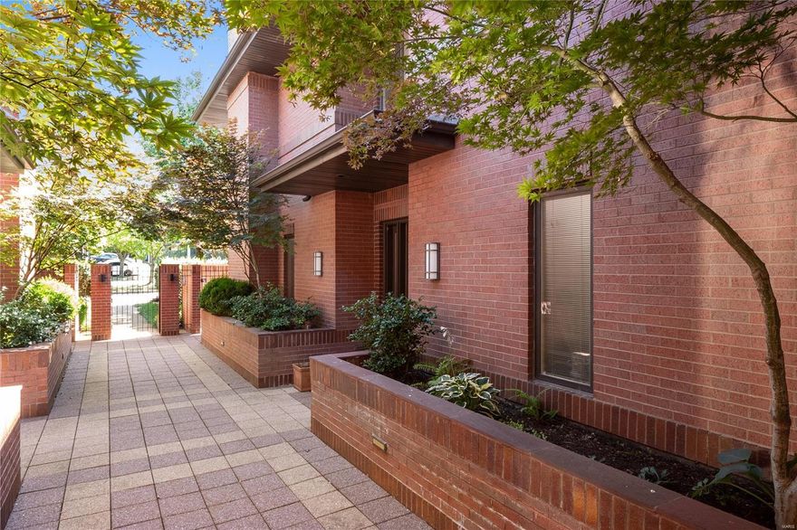 Contemporary condo is nestled in University City with lush gardens and on the cusp of Clayton border.  Lovely home has an elevator and boasts over 4300 sqr ft of living space. Enjoy your private inground swimming pool! Built by the developer for his personal residence, this home has it all! Standing date on Taco Tuesday at Taco Budda, located just a half a block away. Spacious living room and dining combination is perfect for entertaining. WB fireplace and French doors leading to a private garden, patio and pool. Soaring 10' ceilings on the main level. Den with built-in shelves could be used for a WFH space with pocket doors for privacy or a family room connected to the well appointed kitchen, center island, high end appliances with a plethora of cabinetry. Breakfast room with French doors to the pool. 2nd level where primary suite has large walk-in closet and bath w/ shower and a relaxing jetted tub. 2 additional bedrooms and large bath. Rec room, full bath in LL w/ garage access Location: End Unit