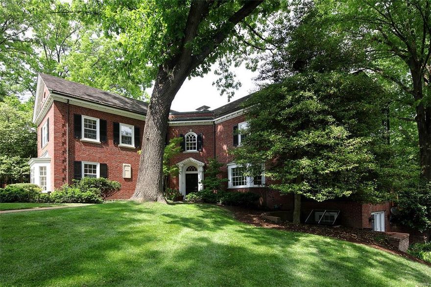 The eye-catching curved brick exterior and the stunning staircase in the entry set the stage for this gorgeous 5 bedroom home on 1.5 private acres. First floor rooms are spacious and light filled with detailed plaster crown moldings, hardwood floors, arched doorways, built in bookcases. There is an enclosed glass porch with delicate wrought iron trim, sunny family room with an entertainment wall and wet bar, eat-in cooks kitchen, new deck with multiple entrances, a 4 car oversized garage and a exercise room. The second floor master has a private sun porch, huge custom closet and luxury bath. 4 more nice sized bedrooms with wood floors and custom closets, and three more baths. In the lower level you will find a second family room, with doors leading to the outside playground, office space and a powder room. Home has been freshly painted throughout. The in ground pool and pool house will be enjoyed by all. Living in the heart of Ladue, this fabulous home will be perfect for any family.