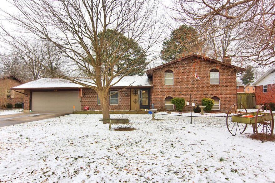 This home is in a quiet neighborhood close to schools and park. This brick tri-level home has 3 bedrooms and 2 baths. Two living spaces.   Lower level features large family room and with gas log fireplace, extra storage, and spacious laundry room.  New updates in 2020 include: a deck, air conditioner, and garage door.   An 18x36 inground pool. Privacy fenced backyard.