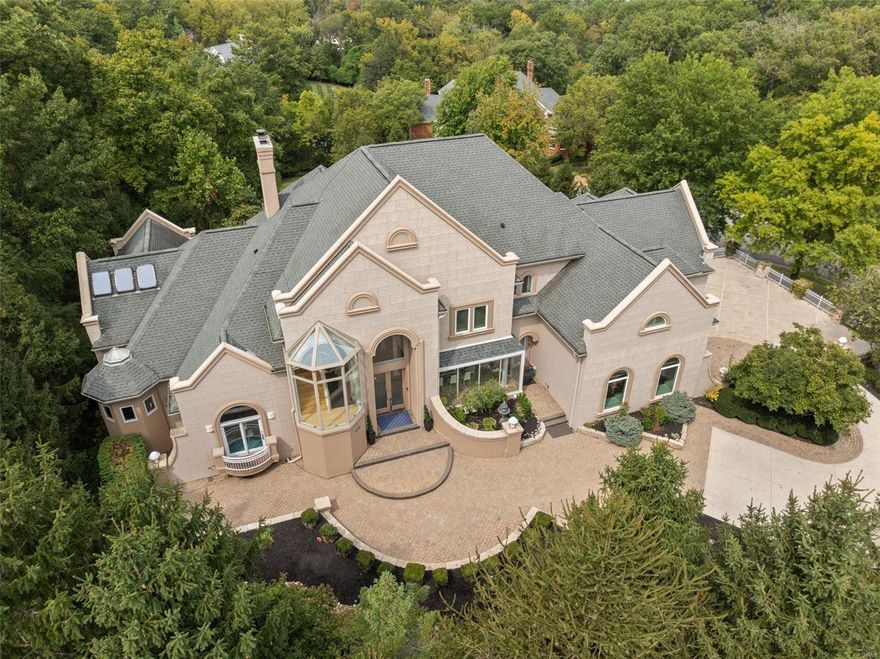 Substantial price adjustment! Now listed at an exceptional value, this home represents luxury living at a significantly reduced price. Take advantage of this rare opportunity. Be prepared to be blown away by modern luxury on a very private cul-de-sac of only 3 homes in prestigious Town and Country. The epitome of luxury living, this floorplan boasts 6 bedrooms, 10 bathrooms, and over 9,500 sqft of refined living space. Hallmarks are an open concept with abundant glass and skylights. Enjoy a two-story great room capturing outstanding views - a two-story water feature with a 2nd stairwell servicing all levels wrapped around a pillar of cascading water. The upper level has 4 bedrooms, all en-suite. The above grade walk-out lower level features media and game rooms, an additional sleeping area, and home office, as well as 2 full baths. Every detail has been meticulously crafted to elevate your lifestyle. Steps away from Longview Farm Park and Masonridge Elementary school.