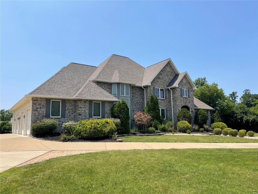 Welcome to this BEAUTIFULLY APPOINTED 1.5 story home situated on a 1 acre lot! You will LOVE the 10 ft ceilings, 8 ft doors, an entry w/SOARING CEILINGS & ENGINEERED WOOD FLOORS throughout the main level! To the left of the entry is a COZY SITTING ROOM w/ a STONE F/P & WOOD MANTLE! Work from home in your PRIVATE OFFICE! The main level features a SPACIOUS OWNERS SUITE AND a JUNIOR  SUITE! The owner’s suite has COFFERED CEILINGS & a LARGE WALK IN CLOSET! The ENSUITE has a DBL ADULT HEIGHT VANITY, a sep tub/shower w/a rainhead & TILE floors & shower surround! The CUSTOM KITCHEN has STAGGERED CABINETS, GRANITE TOPS, DESIGNER 6 BURNER GAS RANGE, a DBL OVEN & SS appliances! There is a BUTLER’S PANTRY w/a wine fridge & SINK! Step out of the dining room to your SCREENED SUNROOM! The living room is just off of the kitchen & has a 2nd GAS F/P! There are laundry rooms on the main & UL! The UL features 3 add’l bedrooms, a JNJ bath and a LARGE LOFT AREA! All of this + a 4 CAR GARAGE! Agent owned. Additional Rooms: Mud Room, Sun Room