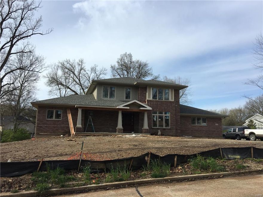 Douglas Properties to pleased to offer this amazing new home in Stoneleigh Towers in a terrific central location. The home will be ready for occupancy in late Spring of 17. This is a Great Opportunity to live in a luxury Douglas Properties home in a terrific location and in Ladue school district. This home is a 1.5 story model with a main floor master suite with attached private sitting room/office/nursery and an additional 3 bedrooms upstairs. This model also features a step down hearth room with fireplace, 3 car side entry garage, mud room, Thermador appliances & open floor plan. Entire 1st floor features hardwood flooring and top of line carpet in all bedrooms and with designer plumbing/light fixtures. This is a rare WALK OUT LOT with a HUGE backyard! There is also 1,500 square feet of high end finish in the lower level, including a large rec room, full bedroom, fireplace and full bath with still plenty of room for storage. Additional Rooms: Mud Room