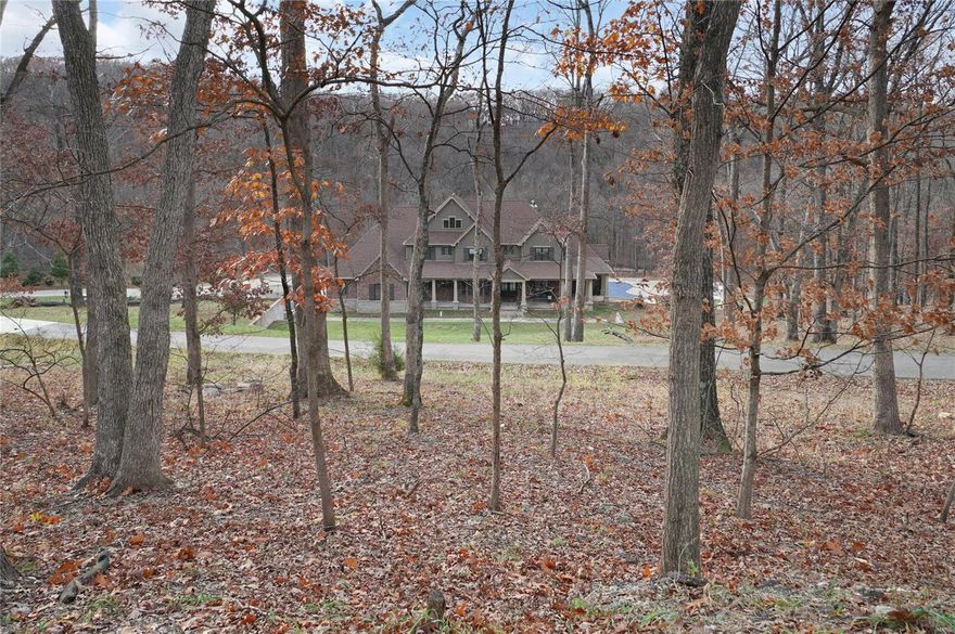 A rare opportunity to own a breathtaking fully custom-built luxury home on over 36 acres of serene Wildwood countryside. This spectacular estate has nearly 9,000 SqFt of living space, modern elegance meets the timeless pull of nature.

This home tells a story of craftsmanship: 10-ft ceilings on both levels, porcelain floors, vaulted ceilings w/decorative beams, and unmatched custom cabinet space. Grand living spaces featuring three fireplaces, a gourmet kitchen with a massive fridge/freezer, double ovens, and a sprawling butler’s pantry.

Retreat to one of five bedrooms, four en-suite. Relax poolside, enjoy the outdoor fireplace, or plan future gatherings in the ready-to-finish pool house/gazebo. With a poultry coop, safe room, exercise room, and massive garage space + parking for over 15 cars, this estate redefines luxury living.

Modern amenities include a whole-house generator, LED lighting, and radon prevention, this home offers the ultimate lifestyle in harmony with nature!