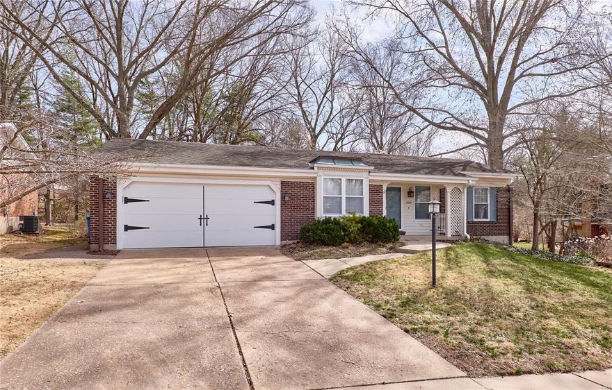 Charming brick ranch home on a cul-de-sac in the quiet, peaceful Sherwood Creek subdivision. 3 bedrooms, 3 full baths, elegant wainscoting in front room and dining room. Solid oak custom cabinets in kitchen with solid surface countertops. Newer HVAC system. Attached 2 car garage with access to the attic via pull down steps that retract into the ceiling. Finished basement with sleeping area/bonus room, workshop, full bathroom and cedar closet. You will love the park-like setting in the backyard with mature trees and a large paver patio for outdoor gatherings.