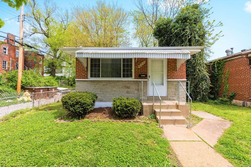 Beautifully Well Maintained Two Bedroom Solid Brick Ranch Home Featuring Energy Efficient Vinyl Windows, Updated Lighting & Plumbing Fixtures, and Gleaming Hardwood Flooring Throughout! Spacious Front Living Room with Stone Ornamental Fireplace and Large Window allowing for Plenty of Natural Light. Separate Dining Area adjacent to Modern Kitchen with Walls of Cabinetry & Counter Top Space along with Stainless Steel Appliances to Stay! Two Generous Size Bedrooms with Overhead Ceiling Fan Lighting and Large Closets share Updated Hallway Bathroom. Full Unfinished Lower Level Basement Perfect for Storage or Future Living Space. Enjoy the coming Spring Season in the Partially Fenced Backyard. Call Your Full Time Realtor for Questions or to Schedule Your Showing Today!