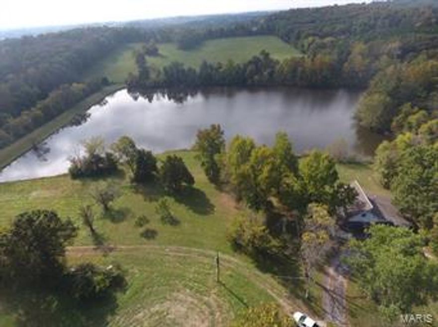 This property is setup perfect for your permanent residence or your weekend getaway. Located between Washington and Union Missouri approximately 30 minutes from St. Louis. With 103 M/l acres of pastures, woods & Farm ground this has everything you have been waiting for! The house and school district is located on the Washington side. In the middle of the property you'll find the 2,032 +/- square foot farm house with the beautiful 5 acre lake right behind it. There is two additional ponds on the property as well as a 3,700 +/- square foot pole barn with concrete floors throughout. The main entrance to the farm is on the Washington side off Highway A. There is an additional 25 acres that can be purchased with this property.