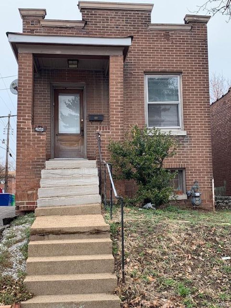 Single family home perfect for a starter home or as an investment.  This house features:  Beautiful woodwork, stained glass windows, and a built in china cabinet.  Large kitchen contains updated cabinets, ceramic tile, and a nice size pantry.  Full size walk out basement and enclosed rear porch.  New roof in 2019 (3 ply fiberglass & hot tar roof) and new A/C in 2021. Close to public transportation.