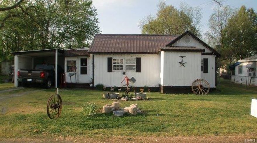 Very affordable 2 bedroom home with 1 1/2 bathrooms. Metal roof was installed in 2022. Both bathroom toilets are NEW. The wooden deck was installed in 2022 which will be connected to an above ground pool this summer. Plenty of room in the fencenced in back yard which includes a garden spot along with an equipment shed and a "MAN CAVE"