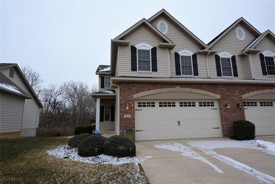 Gorgeous MOVE-IN-READY 3BR, 2.5BTH townhome w/2180+SF. This maintenance free end unit is nestled on a premium lot backing to common ground & trees offers modern, clean lines w/brick & stone front, lush landscaping & 2 car garage. Pride of ownership shows w/a stunning interior that shows like a display w/open floor plan, modern paint tones & upgrades throughout. Entry foyer w/gleaming HW floors opens to elegant dining rm & spacious great rm featuring a gas FP flanked by window & door to the maintenance free deck. You'll love the eat-in kitchen w/custom cabinetry, granite countertops, center island w/bkft bar, SS appliances & pantry. Powder rm & laundry complete the main. The upper level offers a luxurious master suite w/ large walk-in closet & deluxe full bath w/dual sink vanity, soaking tub & sep shower. 2 add'l BR, full bth & family rm complete the upper lvl. The walkout LL w/rough in for BTH is just waiting for your custom finish for added living space. Won't last long....A MUST SEE! Location: End Unit, Ground Level, Suburban