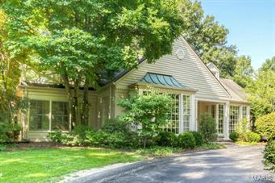 SOLD AT PREMIERE! Nestled on one of Ladue's most private lanes and cul de sac lots, this slice of the Hamptons or Cape Cod is sure to exceed even Buffy and Jasper's expectations and desires. The unrivaled floor plan centers around the most stunning hearth room/kitchen imaginable. Designed to be equal measures state of the art and comfortable. A mecca for fellowship and creativity it is the ideal spot to admire the gardens outside whilst making dinner and sharing drinks with all your friends and family! Stunning formal rooms offer boxed bays, intricate mouldings, hardwoods, fireplace and direct access to a four season's room with three sides windows and stove. The ideal spot for watching the snow fall or birds gather in the oversized side yard. First floor master offers incredible bath and direct access to season's room. 2nd floor master has direct access to terrace. 3rd and 4th beds share hall bath. Lower level has fireplace and newer 1/2 bath. Incredible mudroom/pet's paradise! Additional Rooms: Mud Room, Sun Room