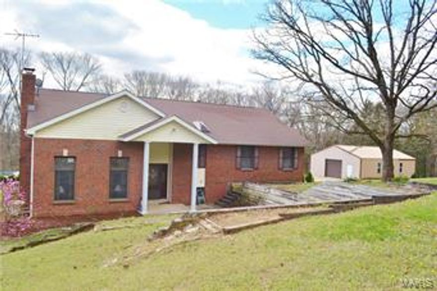 Enjoy your private retreat on 10 +/- wooded acres with a unique multi-level home featuring a large deck, pool, os 2 car garage and a fantastic 20x30 outbuilding with concrete drive.
Large master bedroom w/ nice walk-in closet, garden tub, separate shower and double sinks.
8x13 laundry/mud room with utility sink.

Add your creative touch to update this home and make it your very own.