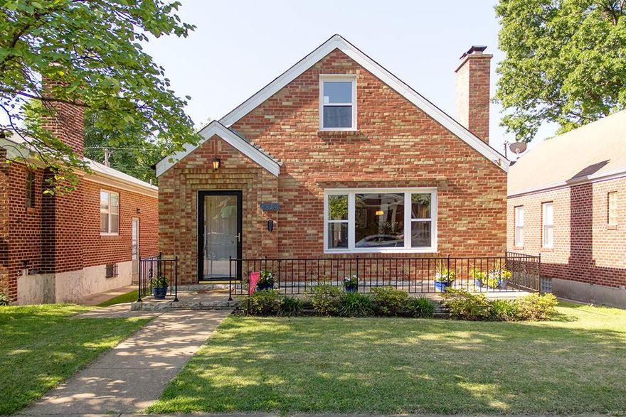 City living at its best in this darling story and a half charmer. The curb appeal is just a start. The first level has handsome refinished hardwood floors, arched doorways, curved architectural corners, six panel doors, two bedrooms, renovated full bath, kitchen and a bonus room off the kitchen. The second level has one legal bedroom with hardwood floors and a bonus room that is perfect for bedroom number four. Intrigued yet? The current owners were sold on the fully finished lower level with another full bath, sleeping area, rec room and taller ceilings. The laundry is located here with the walk out to the backyard and even a retro laundry sink. Detached one car garage and large patio complete this move in ready home. During their ownership, new 6-panel doors, fresh paint, full renovation on main level bath, new garage door opener and refinished hardwood floors.