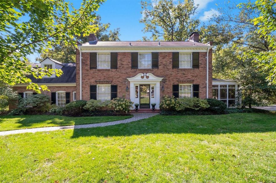 This inspired home could serve as the backdrop for a Ralph Lauren ad - Classic American style blend’s well with a modern, open floor plan. The gracious formal living room, den/possible 1st floor bedroom with ensuite 1/2 half bath, mudroom entry from 2-car garage, screened-in porch, and large deck center around a kitchen/hearth room combo that boasts cathedral ceiling, breakfast bar, bay window, fireplace, built-ins, and open stair access to finished lower level rec room. 1st floor has multiple French doors lending to porch and deck overlooking the large, beautifully landscaped yard that backs to woods - enjoy the privacy few Ladue properties this central can offer. The 2nd floor bedroom layout is well suited for needs of all sorts: two comfortable size bedrooms share a charming hall bathroom, a third bedroom is a perfect guest/teenage suite with multiple closets and private bathroom, and the master suite is huge with large walk-in closet and 5-piece bathroom. Hurry, this home is a gem!