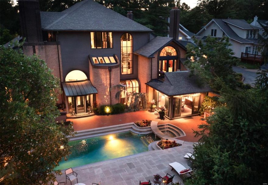 OPEN HOUSE: Sun, 8/7, 1-4p.  Stunning architecture and soft-contemporary design blend beautifully throughout the 6,100+ sq. ft. in this beautiful Clayton home. The Living-Dining Rms are bright and open, and flow perfectly to the Gourmet Kitchen w/stainless, granite & custom cabinetry.  The Hearth Room w/custom cabinetry, leads to the Breakfast Rm, offering beautiful views of your private outdoor retreat.   The Master Suite has a spa-like Bath, private deck, and Birdseye maple cabinetry in the Changing Room.   There are 2 additional bedrooms, 1 now a home office.   Plus, 2 more luxurious Full-Baths.  The pool, patios, and lush gardens will amaze you!  A separate Guest House has a Living Rm, Kitchen, Full-Bath and a large Bedroom. The Main and Guest House combine to deliver 6,113 square feet of luxury! Private elevator services all floors.  Added features: .28/acre double-lot, 2 laundry areas, and a Bonus Kitchen in the Finished LLVL.  Sales incl: 7747, 7741.  Be sure to see the video! Additional Rooms: Mud Room