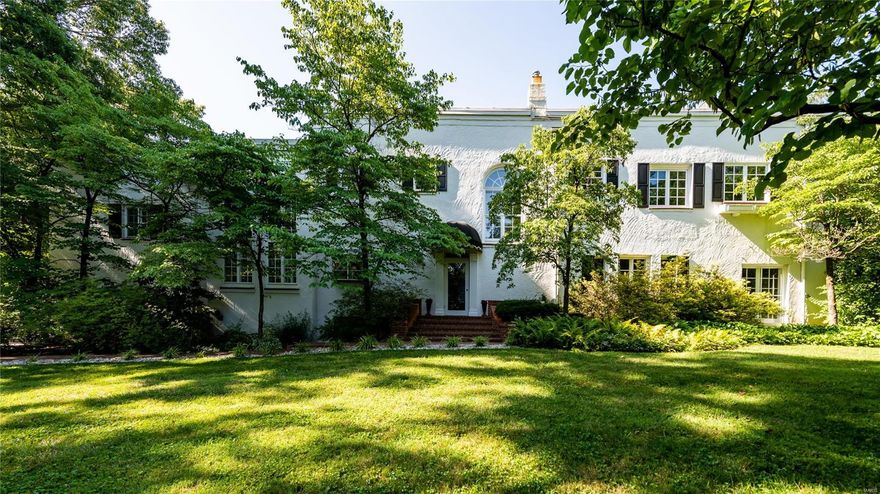 Classic and sophisticated, 4b/3.5b Ladue home surrounded by lush and mature grounds. The magnificent entry foyer is highlighted by a curved staircase. Formal living room and dining both provide access to the private brick terrace, the perfect place to entertain al fresco overlooking the 1+ acre, level lot. The family room with wood burning fireplace calls for backgammon or a movie. Ornate moldings, sun-catching windows, and architectural uniqueness throughout. Gourmet, eat-in kitchen offers plentiful cabinet space, granite counters, and a peaceful sitting room. The UL includes a glorious master suite with fireplace, sunroom, attached office/dressing room, and updated private bath. 3 more spacious bedrooms including another ensuite bedroom, a sunny loft area to catch up on afternoon homework, and an additional sunroom complete the UL. Updated baths, Palladian windows, wood floors, and a circle drive leading to the attached garage. Walk to Tillis Park. Close to highways, schools, & more.