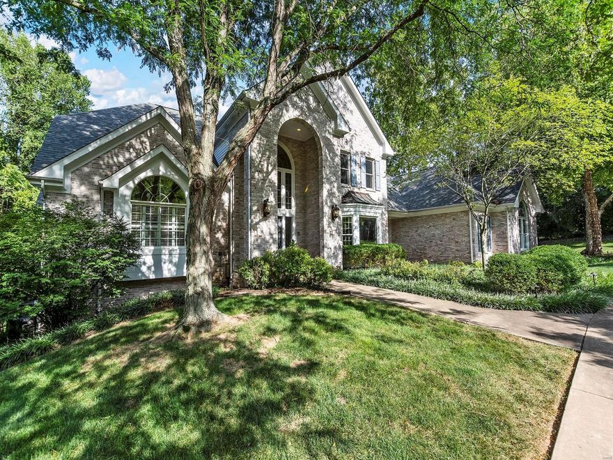 Situated on a sweeping lot in the heart of St. Louis County, this home is sure to please! Greeted by an attractive brick front, you'll step inside to a light and bright 2 story entry foyer. The soaring windows will beckon you into the living room with views of the private backyard and pool! A wet bar will be the hub for gatherings. Stepping through into the warm kitchen and breakfast room and adjoining hearth room you'll feel right at home. A breakfast bar, double ovens, walk in pantry and more are perfect for everyday living and entertaining. Through the butler's pantry and into the dining room, you'll notice the impressive bay window. Ready to relax? There are not one but 2-bedroom suites on the main floor! Upstairs you'll find 3 additional bedrooms and 2 bathrooms. In the lower level you'll find a spacious rec room, another wet bar, as well as a full bathroom and changing rooms with prime access to the backyard and pool. A 3-car attached garage completes the property. Additional Rooms: Mud Room