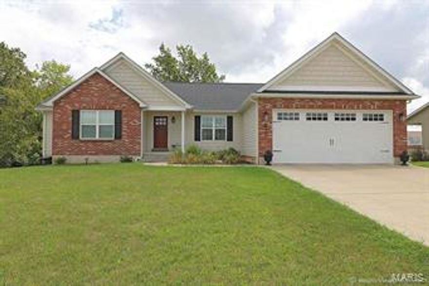 Captivating 5 bedroom 3 bath home located within walking distance of downtown Farmington – this home is calling your name! Spacious and open floor plan greet you as you walk through the front door, cozy gas fireplace in the living room, breakfast bar in the beautiful kitchen complete with stainless appliances and you can enjoy your dinners in the adjoining dining room. Master bedroom has vaulted ceilings and bath has double bowl sink as well as a separate tub and shower.  The lower level has two of the bedrooms, one is currently being used as a music room. Family room as well as a den/office- lower level walks out! Like to BBQ? The covered back deck is a great space for you! Call today for more information.