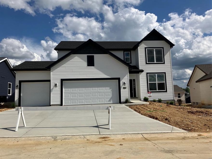 The Ash offers 2456 sq ft - a 2 story with 4 bedrooms, 2-1/2 baths, walk in closets in each bedroom, a walk in pantry in the kitchen & main floor laundry! Impressive list of INCLUDED features with our Signature Series Bonus Package: Low maintenance .44 vinyl siding,  full sod yard with professional landscaping, 10 yr foundation leakage warranty, architectural shingles, vault in Master Bedroom, laminate flooring in entryway, stainless steel appliances (including built in microwave, dishwasher & smooth top range), Pestshield system, tilt in windows, adult height vanity & shower w/ seat in Master Bath, enclosed soffit/fascia, soft close cabinets, 50 gallon water heater, upgraded insulation & more. Upgraded quartz kitchen counter tops.